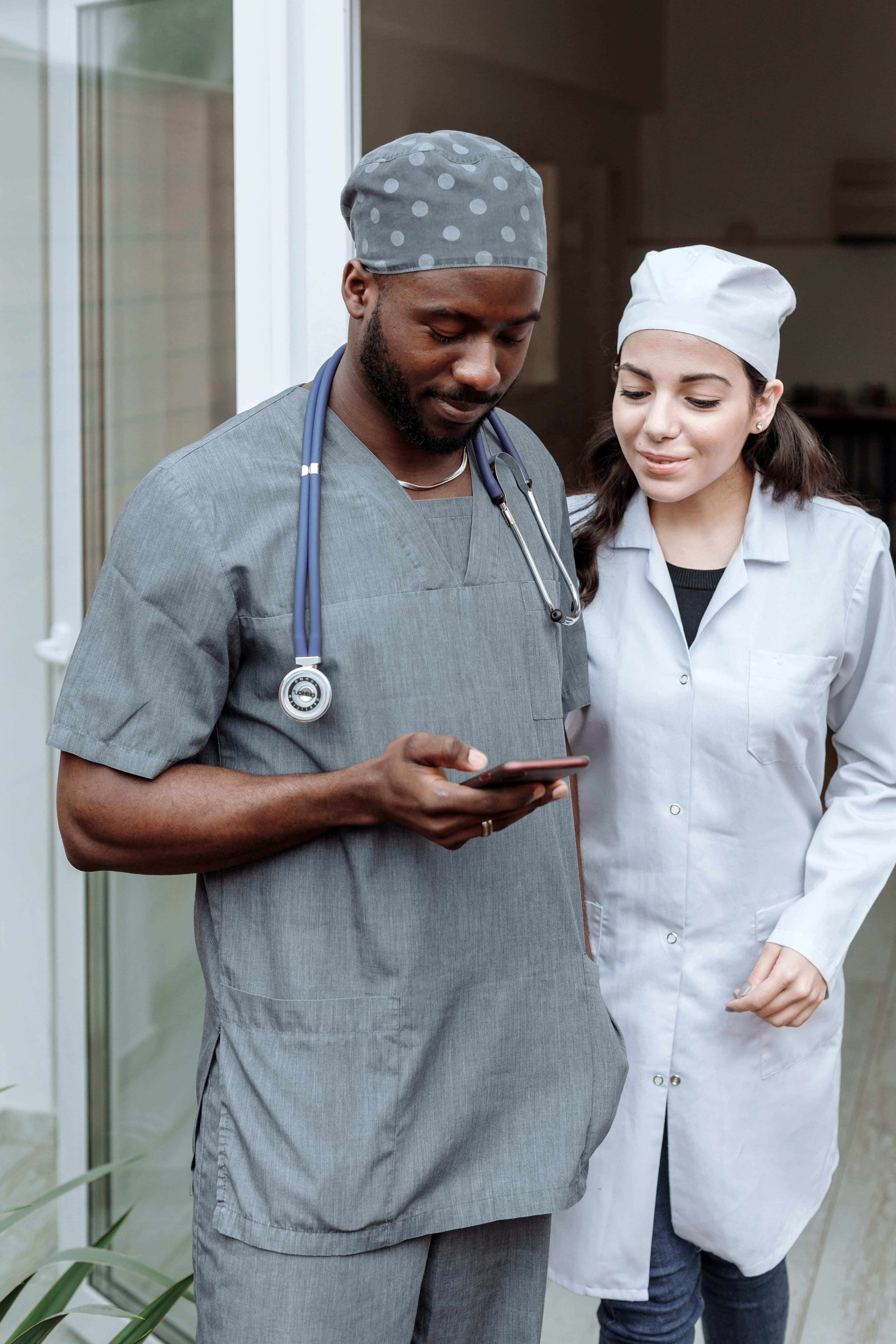 Nurse using tablet in clinical setting